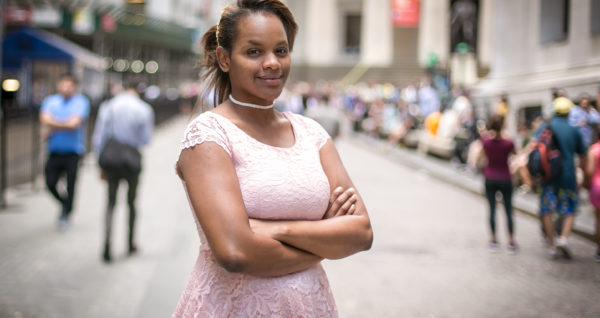 Adama Lee Bah, 22, in the Financial District of Manhattan on June 26, 2017. Bah, originally from Guinea, was 7 when she was forced to undergo FGM and she now works to help end the practice. (Benjamin Chasteen/The Epoch Times